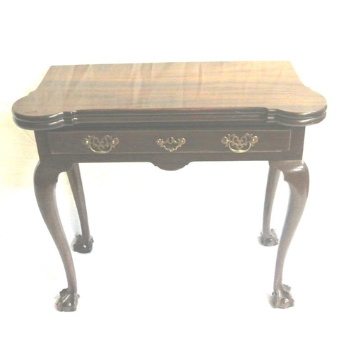 41 - Georgian mahogany card table with fold-over top, with gateleg support, counter wells and 