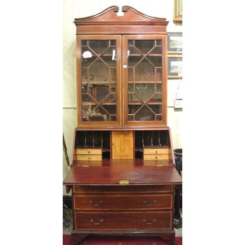 50 - Edwardian Sheraton style inlaid and crossbanded bureau bookcase with scroll arch pediment, glazed in... 