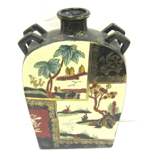 17 - Oriental Cantonese style flask with shape handles and panelled decoration