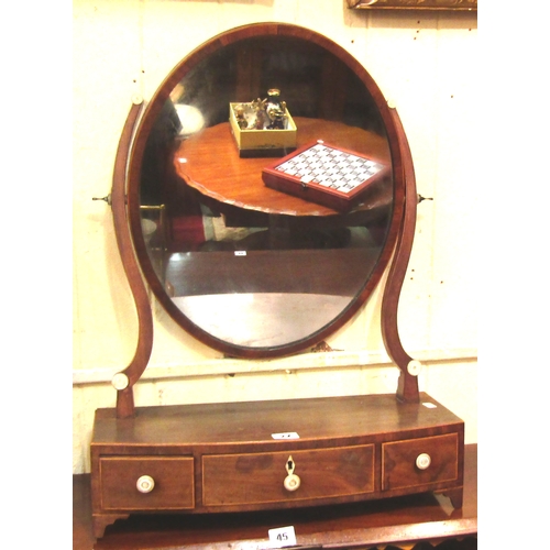 42 - Edwardian inlaid walnut swivel mirror with shaped columns, on bow fronted base with three drawers
H6... 