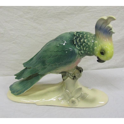 12 - Victorian style porcelain figure of a cockatoo on shaped base