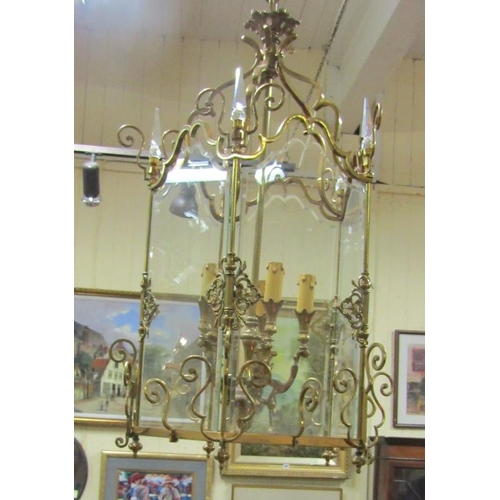 28 - Ornate Louis XV style brass framed hall  lantern with bevelled glass insets, shaped branches and scr... 