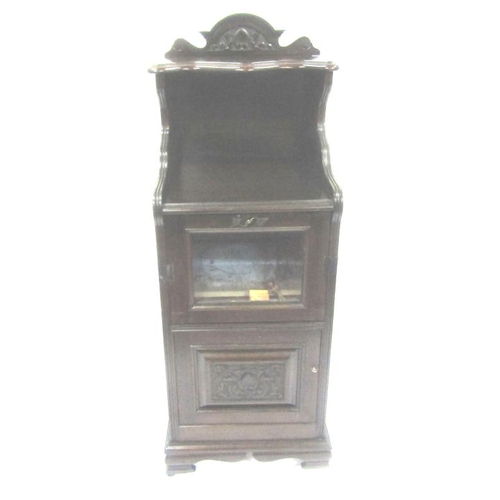 41 - Edwardian mahogany pedestal cabinet with shaped shelf, glazed door with drop-down front, press under... 