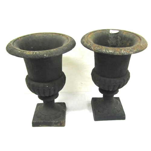 44 - Pair of small cast iron flower vases with ribbed socles and square bases H25cm