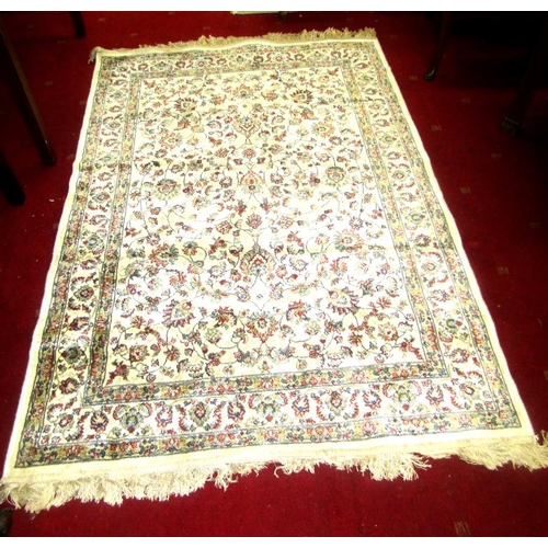 56 - Ivory ground woven silk rug with all over floral design  183X118 (6FTX3.5)