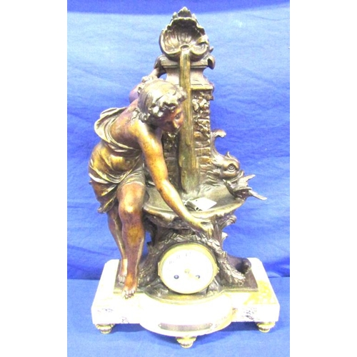 87 - Regency style figured mantle clock with the figure of a girl by a birdbath with circular brass frame... 