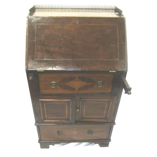 91 - Edwardian inlaid and crossbanded mahogany bureau with brass gallery, fall-out front with pull-out su... 