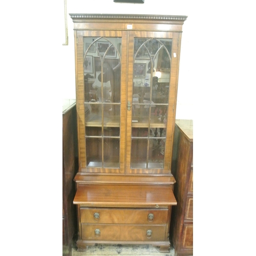 105 - Edwardian satinwood secretaire bookcase with glazed door, shelved interior, pull-out shelf, three dr... 