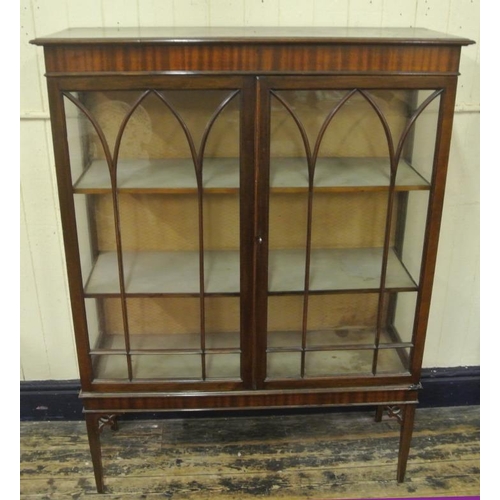 20 - Edwardian mahogany display cabinet with glazed doors, shelved and lined interior, on square tapering... 