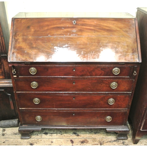 55 - Georgian mahogany bureau with fall-out front, pull-out supports, interior fitted with cubby holes an... 