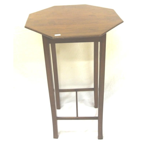9 - Edwardian mahogany hexagonal shaped occasional table having square legs with stretcher support