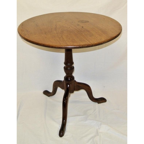 34 - Round Victorian mahogany circular occasional table with tip-up top, vase turned column, on hipped tr... 