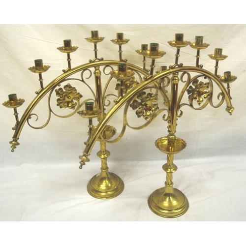 92 - Pair of Victorian style brass menorah with foliate decoration and circular bases