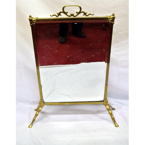 1 - Edwardian brass framed beveled mirrored fireguard with shaped handle and legs