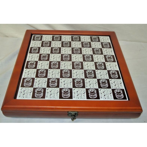 9 - Ornate chess set with figured pieces in carrying case