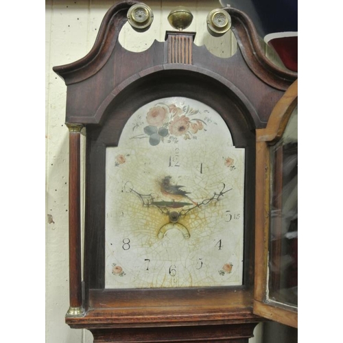 35 - Georgian mahogany longcase clock with scroll arch frieze, old enamelled face with foliate decoration... 