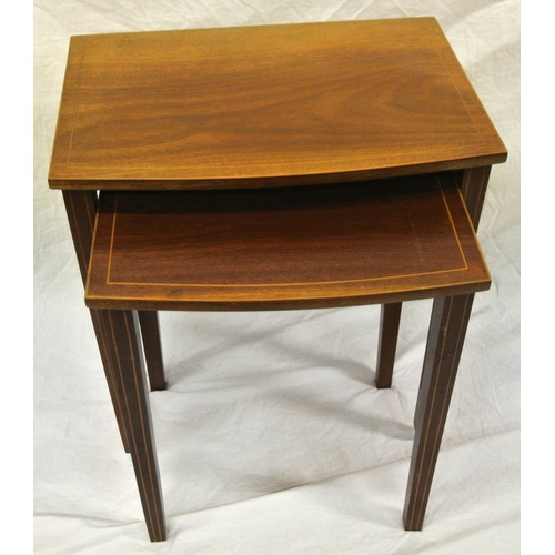 49 - Edwardian inlaid mahogany nest of bowfronted tables with square tapering legs