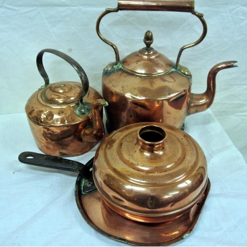 22 - Assorted lot of Victorian copper items: two kettles, a jug and pan