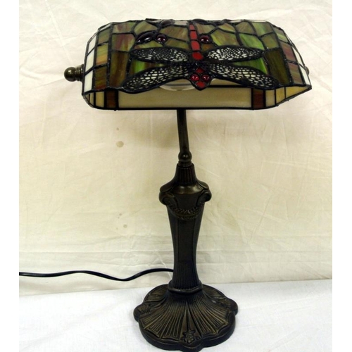 43 - Ornate bronzed bankers lamp with butterfly decorated multi-coloured shade