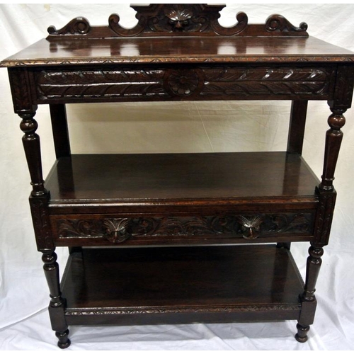 5 - Victorian oak three tier dumbwaiter with ornate foliate carving, shaped back, frieze drawer, on turn... 