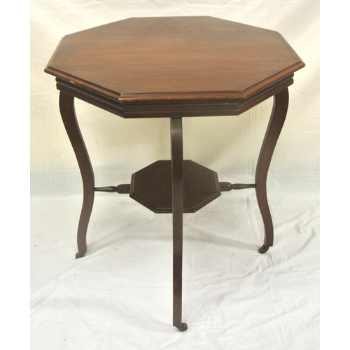 45 - Edwardian hexagonal shaped occasional or centre table raised on ring-turned shaped legs with castors