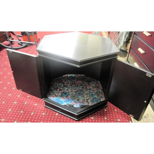 12 - Hexagonal shaped American ebonised chest with ornate handles