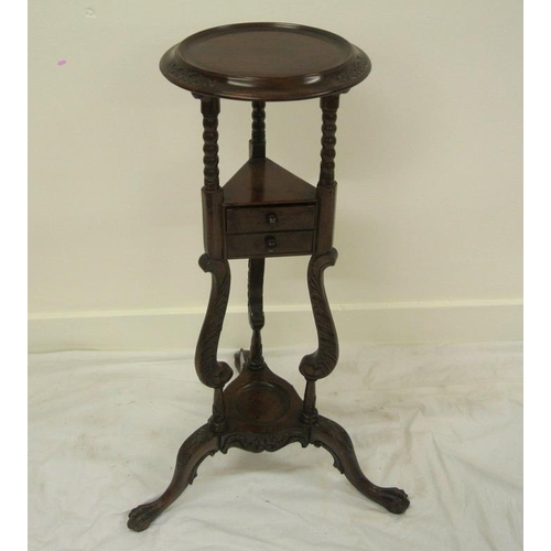 31 - Edwardian design shaving stand with round top, two drawers, ornate foliate carving