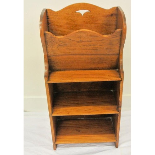 57 - Edwardian oak book and magazine rack with wavy tops