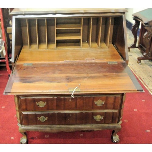 60 - Edwardian bureau with wavy front, drop-down shelf, fitted interior, three drawers under with brass d... 