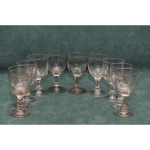 17 - Set of 7 circular wine glasses with hexagonal stems and circular bases