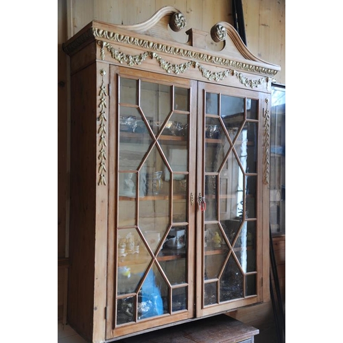 335 - Edwardian style pine bookcase top with astragal glazed doors, shelved interior, gilt foliate applied... 