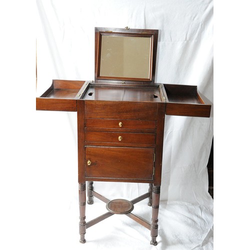 40 - Edwardian mahogany washstand with lift-up lids, two drawers and press under, brass handles, on turne... 