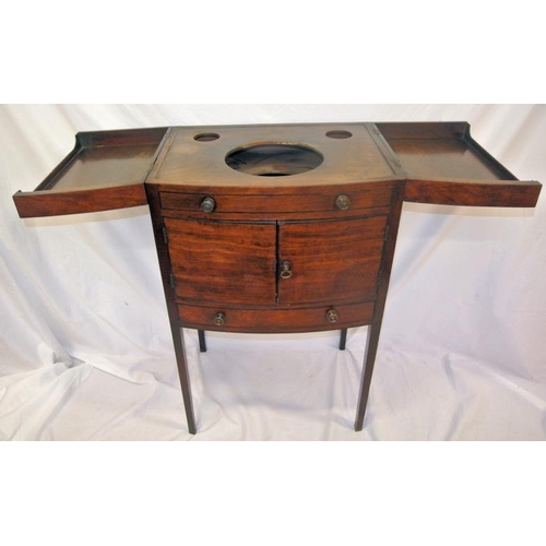 55 - Edwardian inlaid mahogany bow-fronted washstand with fold-out top, press and drawer under with turne... 