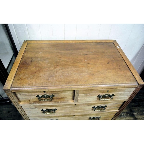 35 - Edwardian style oak chest of two short and three long drawers with ornate brass drop handles