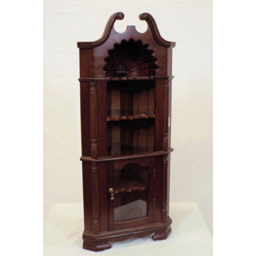 13 - Apprentice model mahogany corner cabinet with shaped shelving, scroll arch frieze, glazed door, bras... 