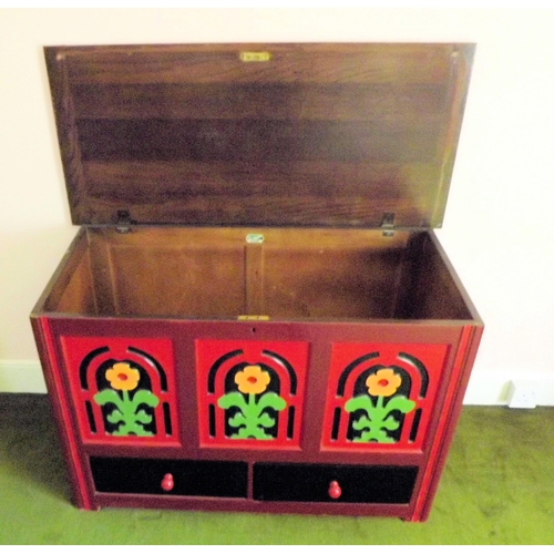 20 - Painted timber coffer with lift-up lid, ornate foliate decoration, two drawers under with round hand... 