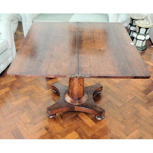 218 - William IV rosewood tea table with swivel fold-over top, rounded corners, turned tapering column wit... 