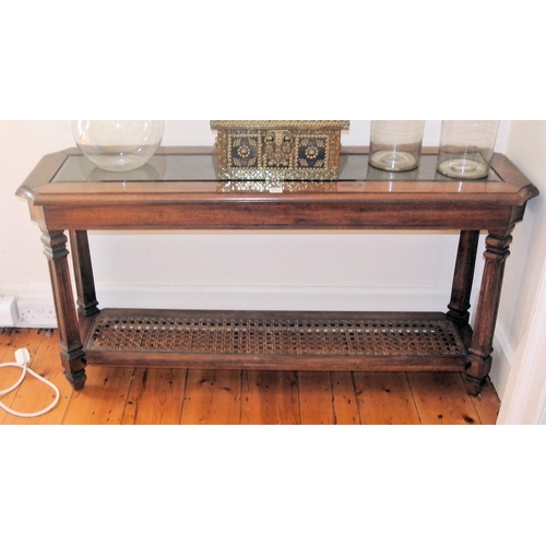 260 - Oblong mahogany hall or side table with bevelled glass inset, wicker base, square tapering columns, ... 