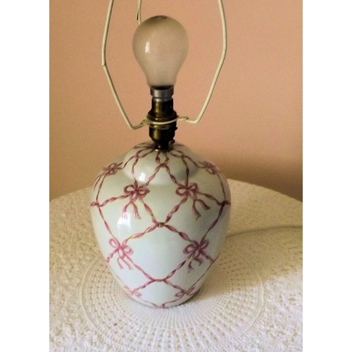 28 - Oriental baluster shaped electric lamp with coloured shade