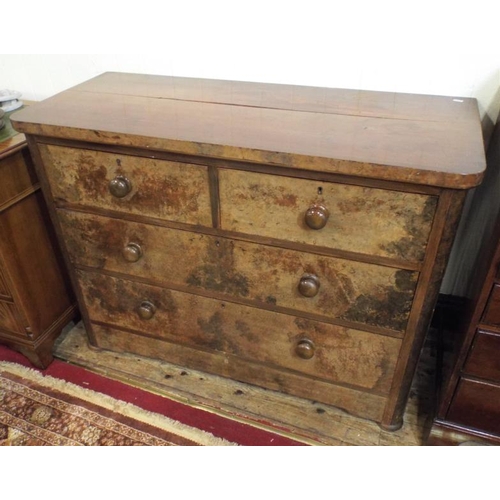 75 - Victorian walnut chest of two short and two long drawers with bun handles and brass escutcheons.
Top... 