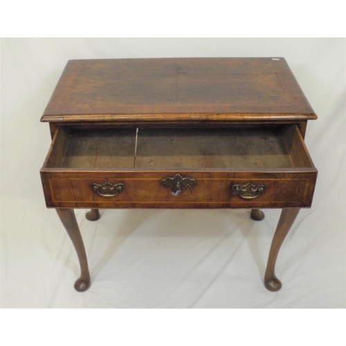 90 - Georgian inlaid walnut lowboy with frieze drawer, brass drop handle and escutcheon, shaped apron, on... 