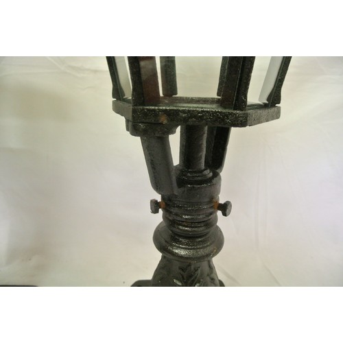 202 - Pair of cast iron outdoor lamps of hexgonal tapering form with glass insets (Not Fitted)