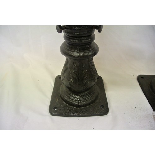 202 - Pair of cast iron outdoor lamps of hexgonal tapering form with glass insets (Not Fitted)