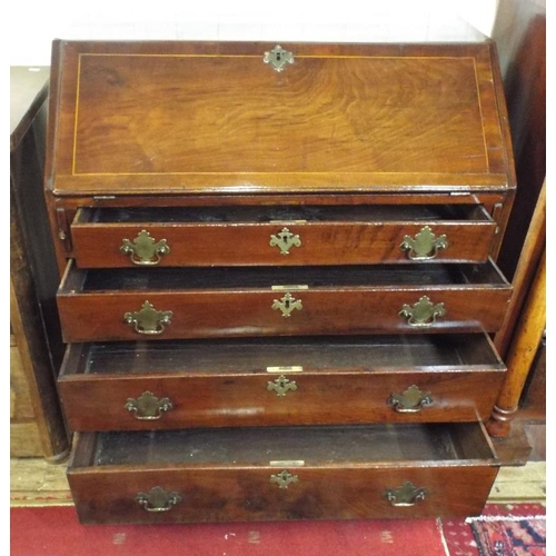 205 - Georgian inlaid walnut bureau with drop-down front, pullout supports, fitted interior, four drawers ... 