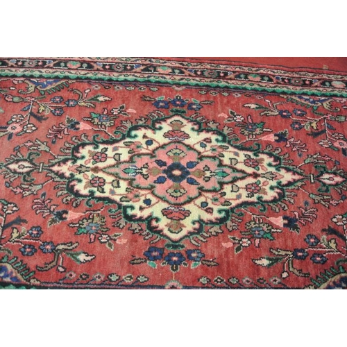 239 - Washed red ground full pile Sarouk runner 319 x 116cm