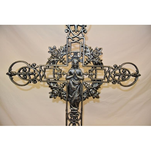 257 - Ornate cast iron cross 'Mary of the Roses' on shaped base