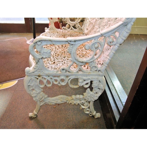 349 - Victorian style cast iron garden bench with double oval shaped back, with ornate foliate decoration,... 