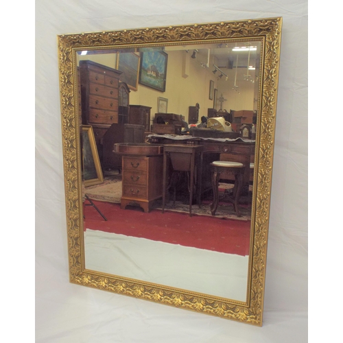 119 - Ornate Regency design gilt framed bevelled wall mirror with foliate decoration