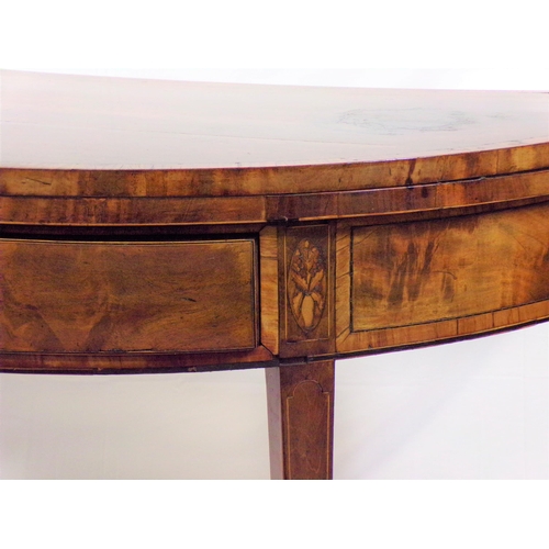 125 - Georgian inlaid and crossbanded mahogany
demi-lune card table with fold-over top, gateleg support, i... 