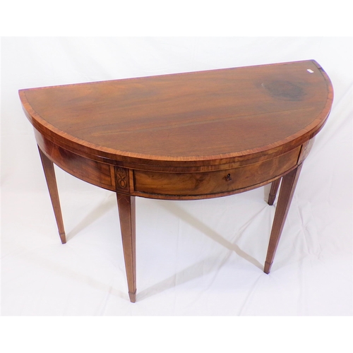 125 - Georgian inlaid and crossbanded mahogany
demi-lune card table with fold-over top, gateleg support, i... 